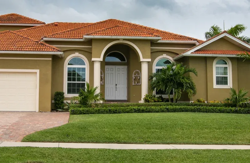 house with nice healthy front lawn