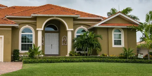 house with nice healthy front lawn